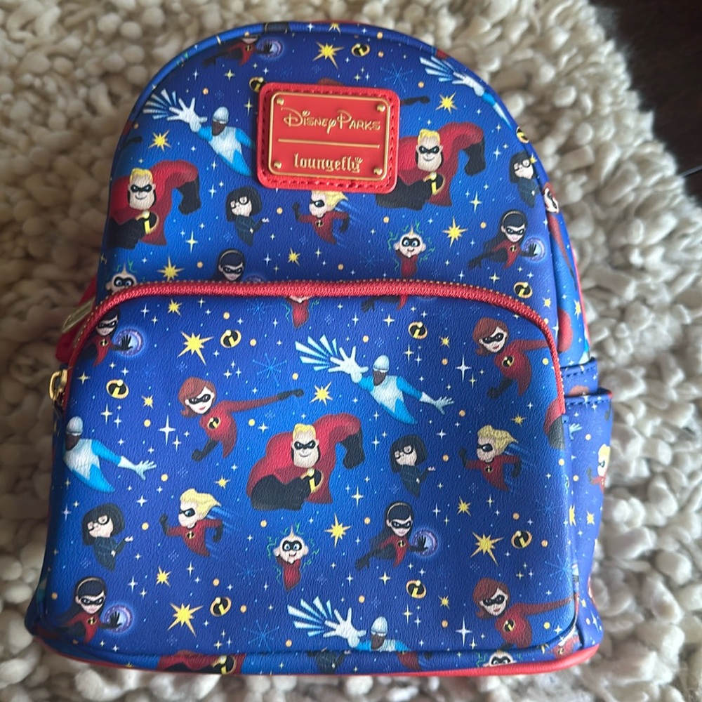 Authentic Disney Park Incredibles bag new with tags.